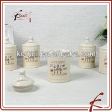 small ceramic spice jars with decal